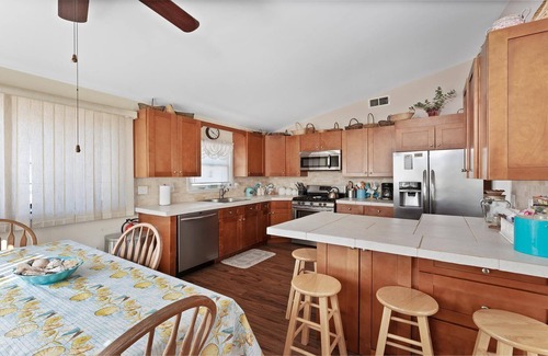 Beach Haven West House | Lagoon front. Single family. Boat slip. Beach Badges. WIFI. Kayak. Bicycles.