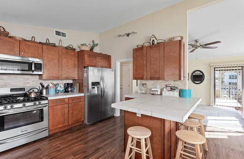 Beach Haven West House | Lagoon front. Single family. Boat slip. Beach Badges. WIFI. Kayak. Bicycles.