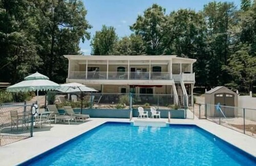 Inman House | Lakefront Cottage with heated pool