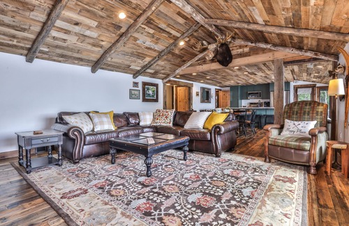 Presque Isle Cabin | Lakefront home on snowmobile trail with kayaks/SUP, fireplace, game room & AC