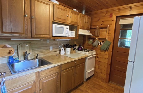 Naples Cottage | Lakeside 2-bedroom cottage sleeps 4. In Naples. Gorgeous views. Steps to beach
