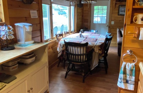 Naples Cottage | Lakeside 2-bedroom cottage sleeps 4. In Naples. Gorgeous views. Steps to beach