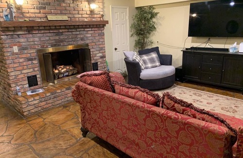 Hattiesburg House | Lakeside pavilion on private lake with a boathouse, outdoor fireplace, kayaks.