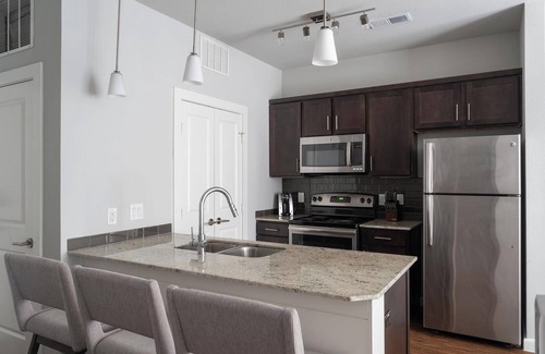 Buda Apartment | Landing | Stylish 1BD, Clubhouse, Pool