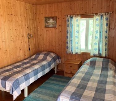 Puumala Ski Chalet | Lappalaisen lomamökit Pihamökki