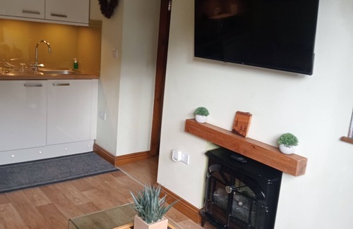 Wykeham Cottage | Larch Cottage Ruston with hot tub (dogs go free)