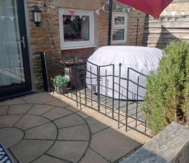 Wykeham House | Larch Cottage Ruston with hot tub, dogs go free