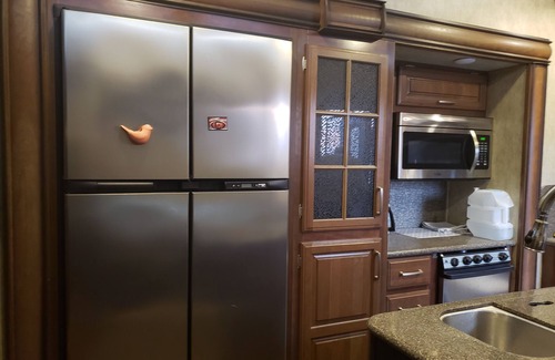 Bradenton RV Rental | Large 41ft RV PET FRIENDLY, sleeps 4, property has 2 pools jacuzzi. Glamping!