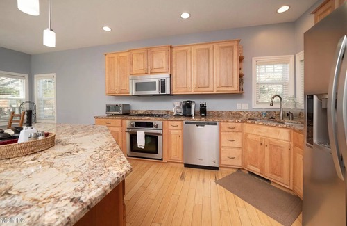 Glenn Haven Shores House | Large Family Home in South Haven - Private Lake Access, Hot Tub, Sunroom & Patio