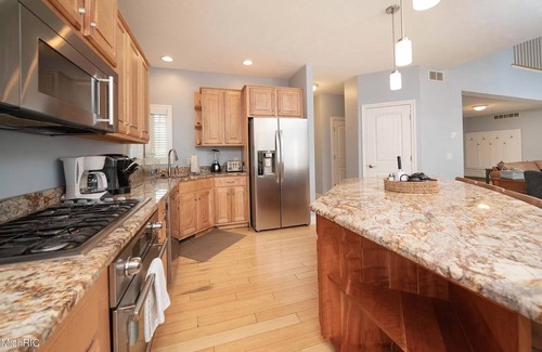 Glenn Haven Shores House | Large Family Home in South Haven - Private Lake Access, Hot Tub, Sunroom & Patio