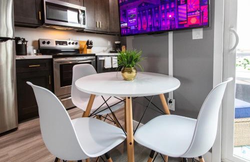 University Heights Apartment | Large-studio-balcony-desk-ac-full-kitchen