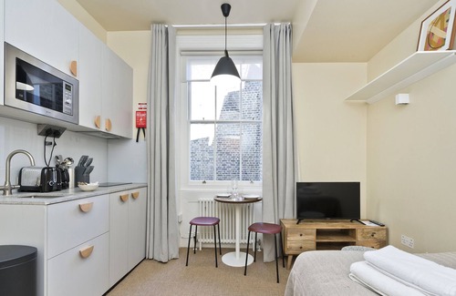 Camden Town with Primrose Hill Apartment | Large Studio With Garden Views in Leafy NW London