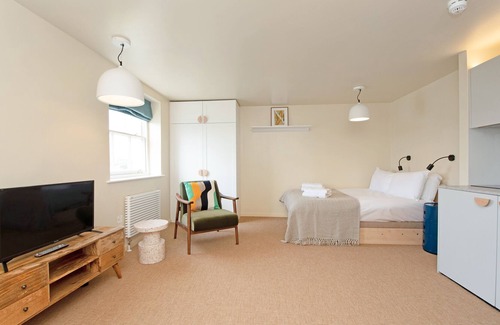 Camden Town with Primrose Hill Apartment | Large Studio With Garden Views in Leafy NW London