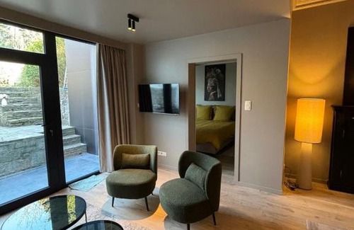 Waha Apartment | Le 76 appartement 2 chambres avec jardin