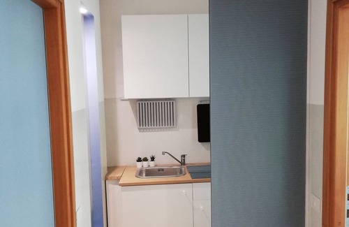 Ivrea Apartment | "Letter 22" apartment, in the heart of Olivetti architecture.