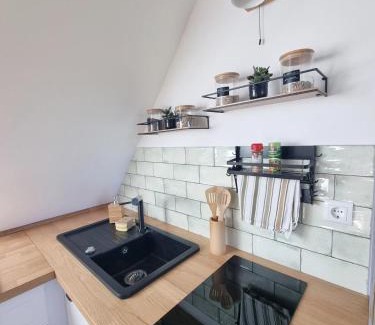 Goldenstedt Apartment | Lichtdurchflutete Dachgeschosswohnung mit Charme