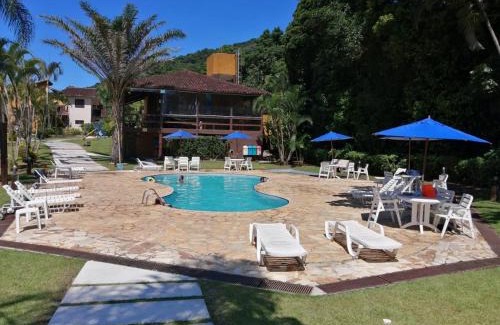 Boicucanga Beach House | Lindo chalé em Boiçucanga Condomínio Village do Mirante Impecável