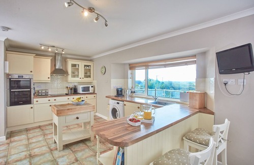 Trelights House | Little Seawynds is a lovely spacious property with panoramic coastal views set above the picturesque