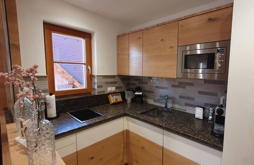 St Andra-Hoech Ski Chalet | Living & Relax Resorts "Your time out with pleasure" with a view of the vineyards