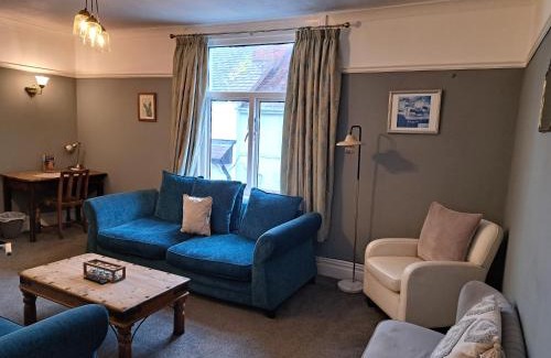 Penrhyn Bay Apartment | Llandudno apartment, quirky pub with tropical beer garden