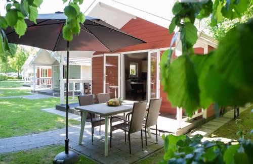 Oirschot Ski Chalet | Lodge in Brabant with Cozy Covered Terrace