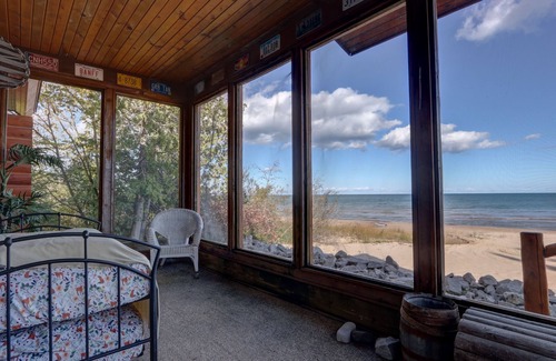 Harrisville House | Log Home On Lake Huron Sandy Beach. Located just north of Harrisville Michigan.