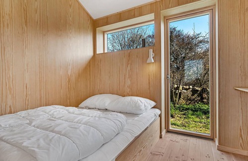 Vang House | Look forward to your vacation in this modern vacation home with sea view.