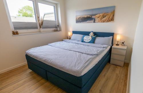 Tossens Apartment | Lotta – Familienfreundliche Ferienwohnung mit Sauna & nah am Strand!