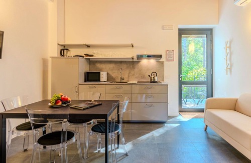 Dervio Apartment | Lovely apartment for 4 guests with A/C, WIFI, pool, TV, patio and panoramic view