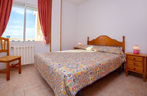 Calpe Apartment | Lovely apartment for 4 people with pool, A/C, TV, patio and parking