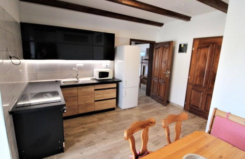 Zupanovice Apartment | Lovely apartment for 9 people with WIFI, pool, TV, patio, pets allowed and parking