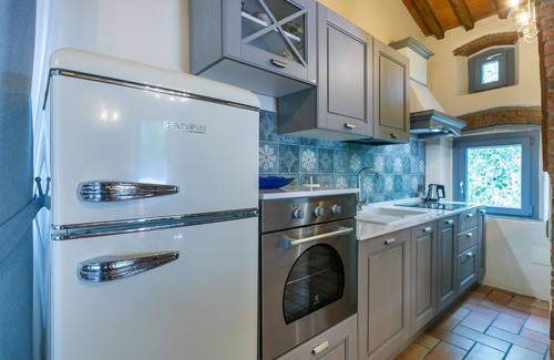 Castagneto Carducci Villa | Lovely apartment in villa for 5 guests with WIFI, A/C, pool, TV, patio and pets allowed