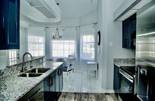 Broadmoor House | Lovely pool house with canal view!