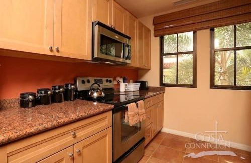 Coco House | Luxe! Impressively designed 2nd-floor unit in Coco done in red and orange hues