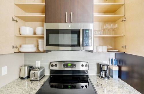 Mueller Apartment | Luxe Mueller Studio w/Pool, W/D & Gym, nr park, by Blueground