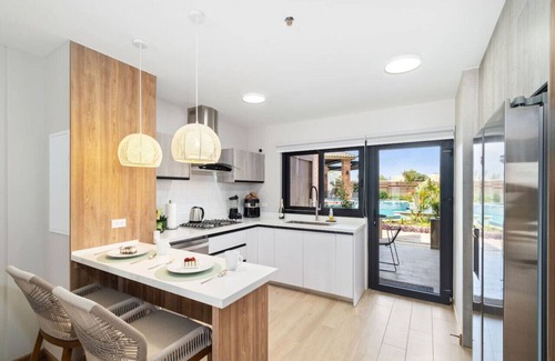 Tuscany Residence Aruba House | Luxe Townhouse Steps from Ritz & Palm Beach at Porta Al Sole 18 by Bocobay