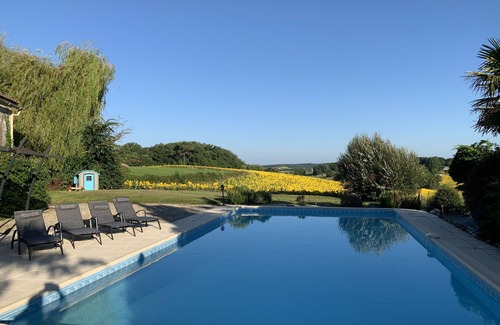 Saint-Capraise-d'Eymet House | Luxurious farmhouse property with chic barn conversion & fabulous pool