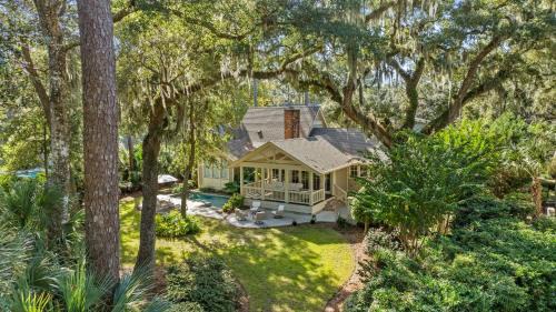 Heritage Woods House | Luxurious 4 - Bedroom Sea Pines Home with Pool, Fire Pit, & Golf Course Views - Sleeps 12
