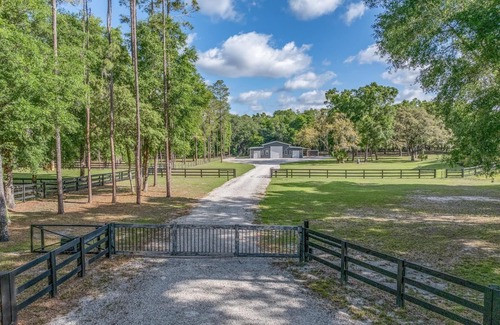 Inverness House | Luxurious 6-bedroom estate with pool, on over 6 fenced in acres