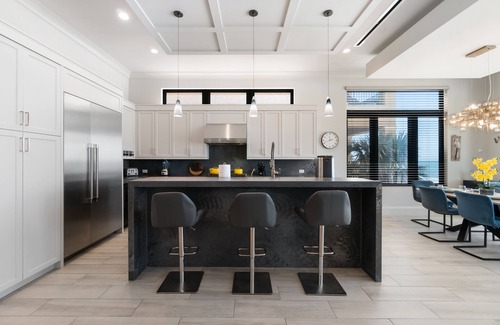 Mid Island Villa | Luxurious Beachfront Vacation Getaway | 4-Bedroom, 4.5-Bath w/Heated Pool & Spa | Sleeps 12