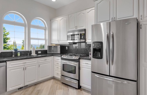 Blaine House | Luxurious dog-friendly bay-view home with hot tub & private beach access