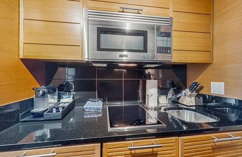 Snowmass Village Apartment | Luxurious hotel room with shared hot tub, on site spa, and ski in/ski out
