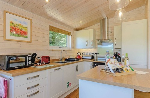 Ashover Ski Chalet | Luxurious lodge with stunning countryside views.