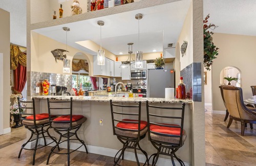 Brooksville House | Luxurious Roman Style Pool Home in Brooksville Near Weeki Wachee and Beaches