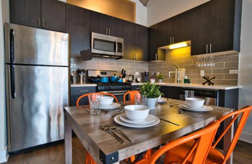 Near South Side Apartment | Luxury 3BR Spacious Suite Sleeps 8 Guests with Patio, Skyline View, Optional Parking and Gym Access Near McCormick Place and Lakefront