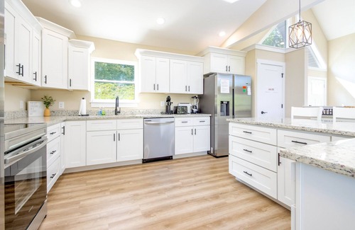 La Follette House | Luxury 6-Bedroom Mountain Lake Retreat with dock slip, Sleeps 18.