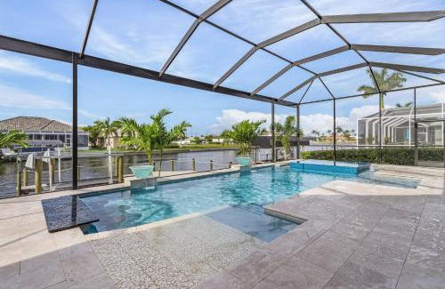 Pelican House | Luxury and Opulence - Gulf Access, Heated Pool & Spa, Custom Outdoor Kitchen - Villa Sunseeker