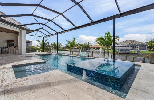 Pelican House | Luxury and Opulence - Gulf Access, Heated Pool & Spa, Custom Outdoor Kitchen - Villa Sunseeker