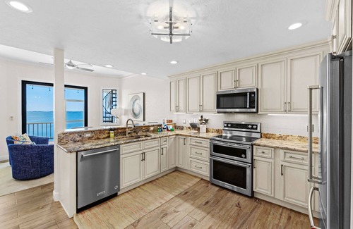Bayshore Gardens House | Luxury Beachfront Retreat~Pool~Game Room~Sleeps 16