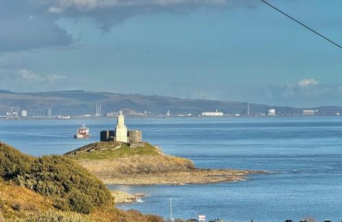 Mumbles House | Luxury Coastal Escape with Mumbles Lighthouse View Pass the Keys